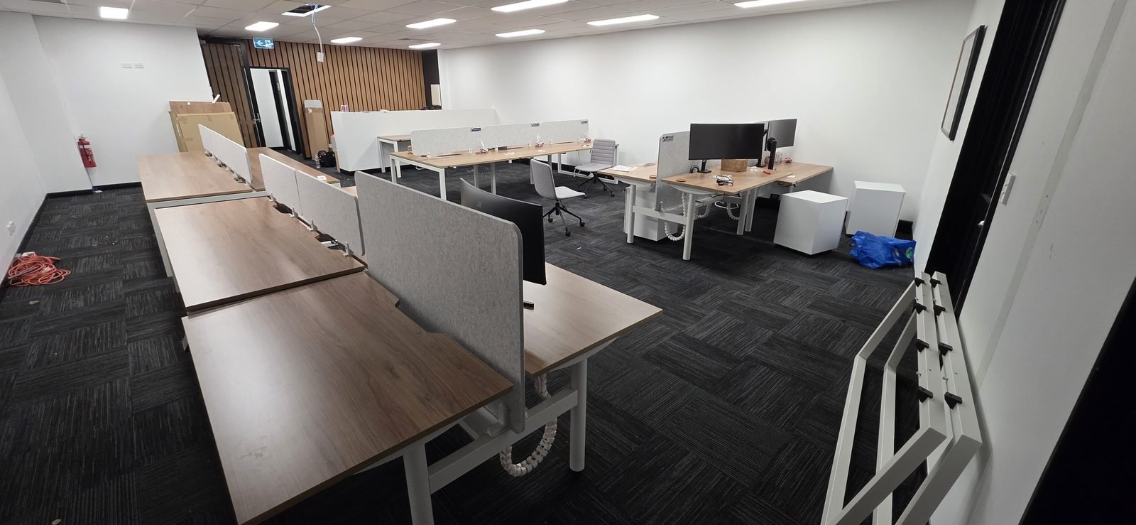 Commercial office desks and workstations assembled on site